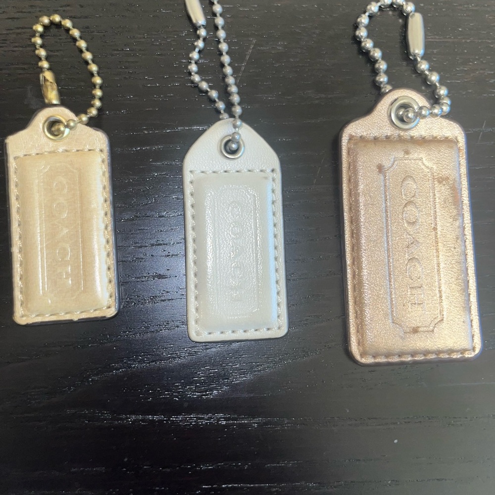 Coach Metallic and Neutral Leather Keychain Trio